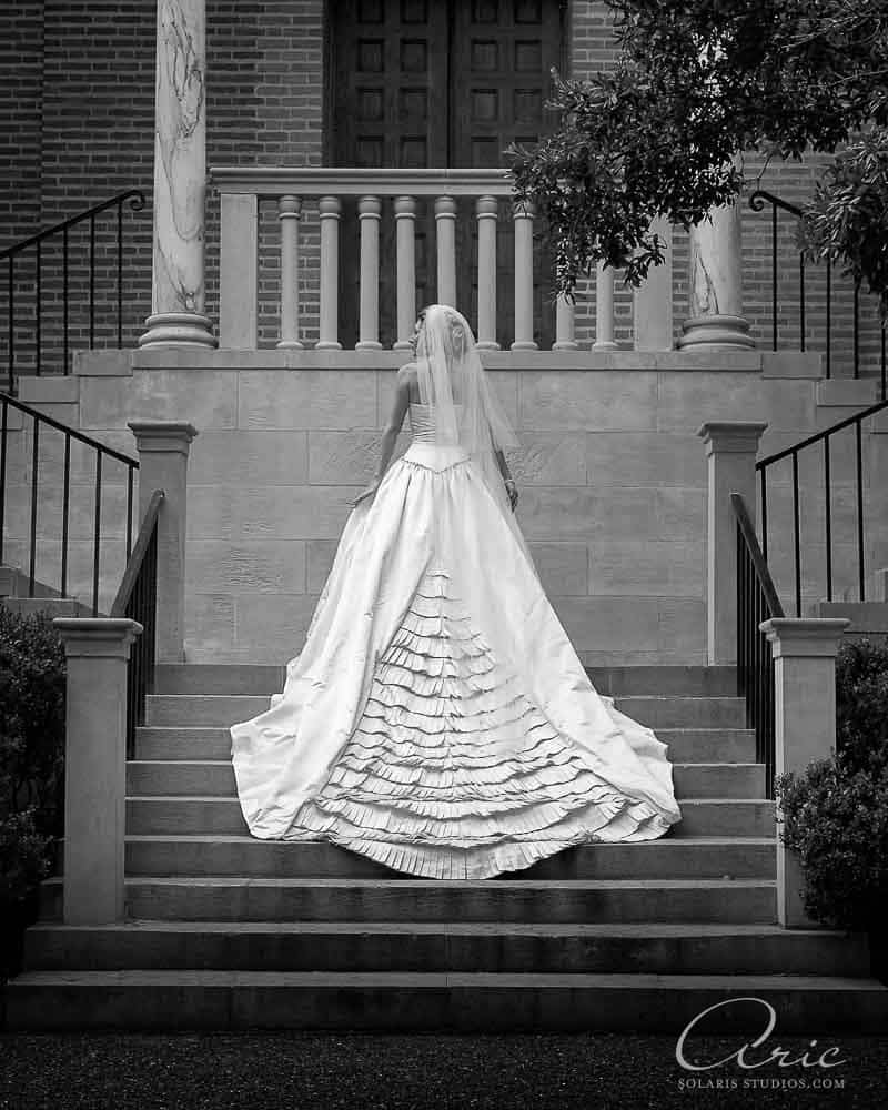 Black and white bridal portrait created on stone stairs.